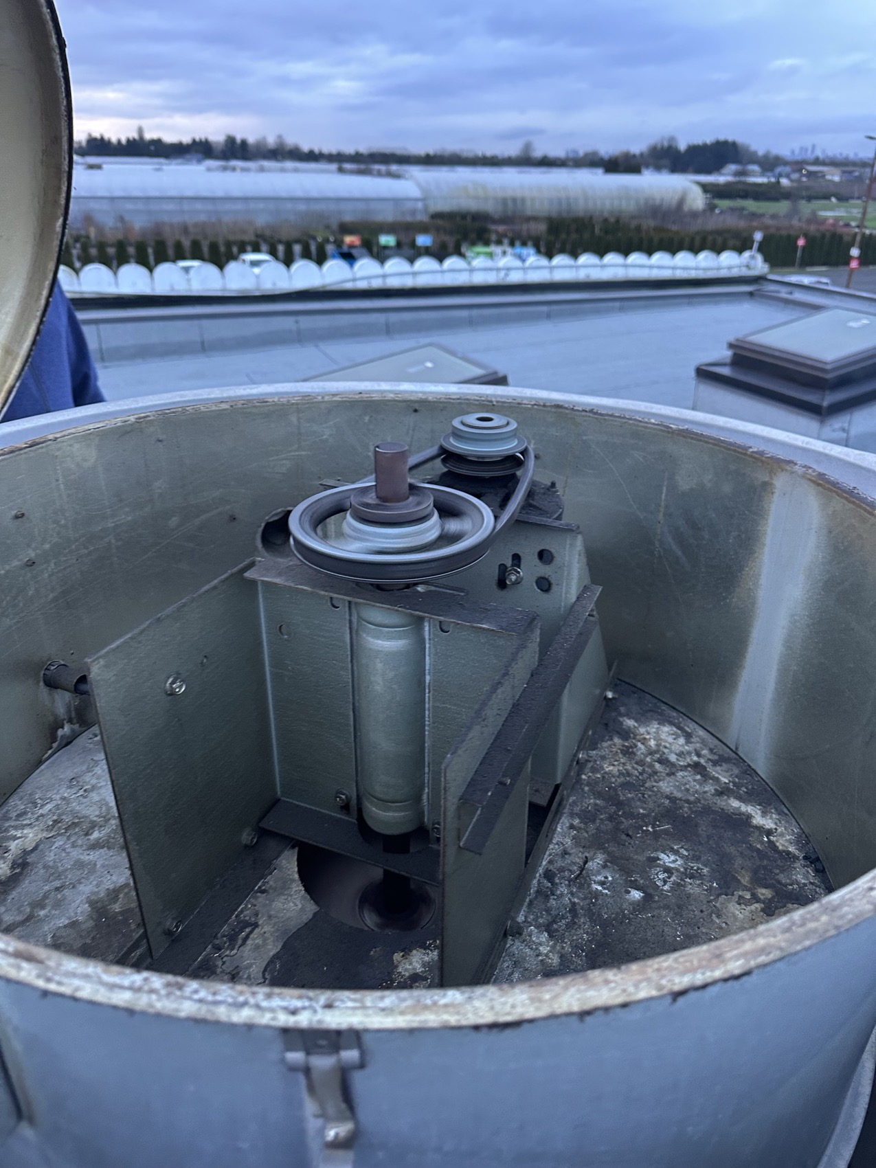 Cleaned rooftop exhaust fan after service