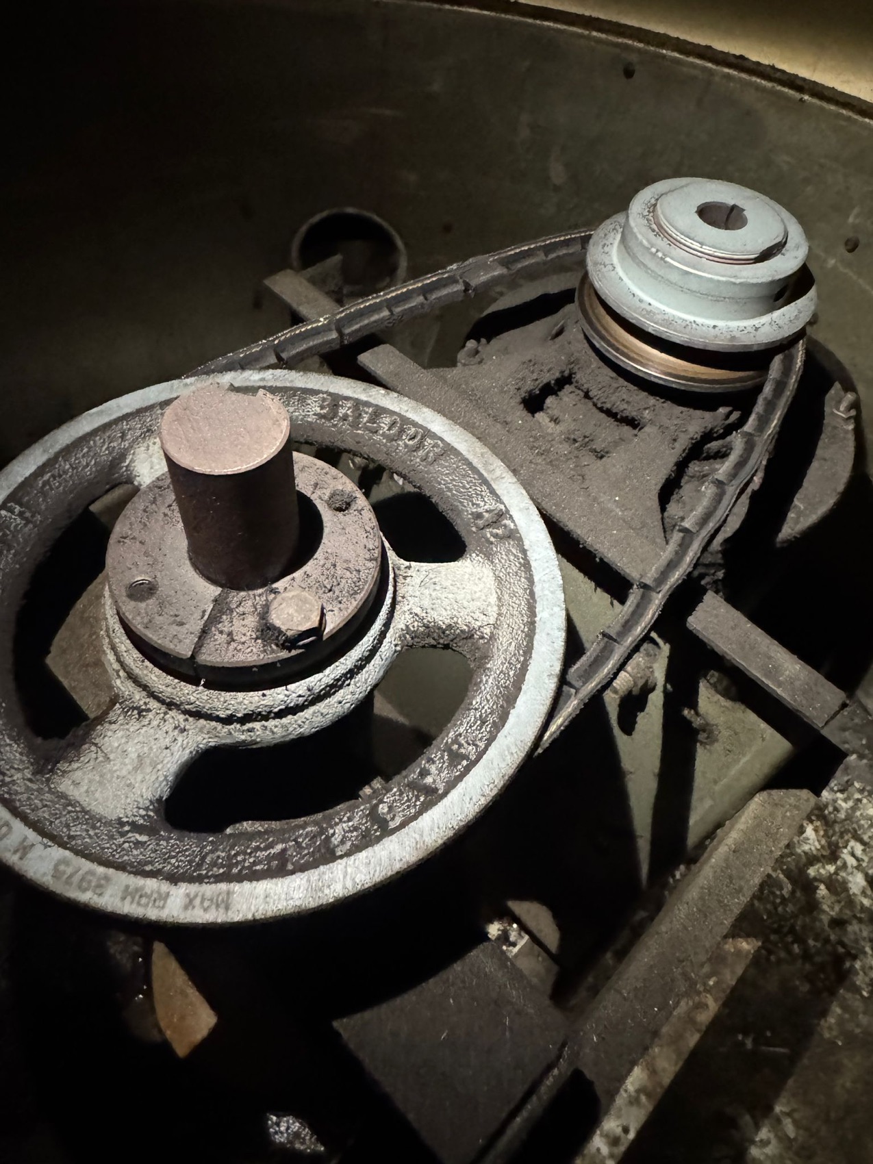 Grease-laden fan pulley before cleaning
