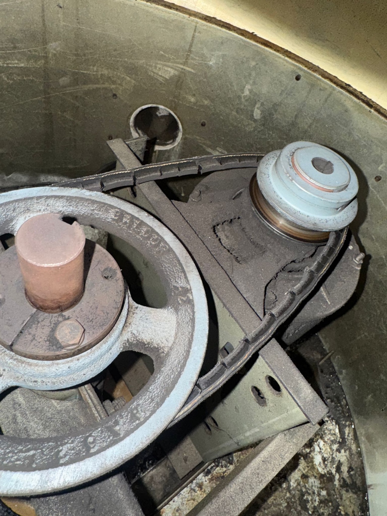 Grease build-up on fan housing before cleaning